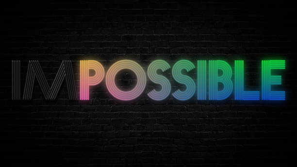 possible impossible colorful word on black brick background, meaning the need to focus on the good, inspiration or success concept stock photo