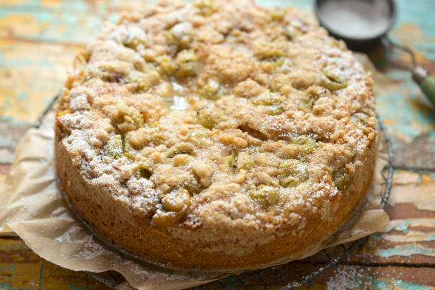 istock Yoghurt gooseberry cake with crumble and icing sugar 1257634495