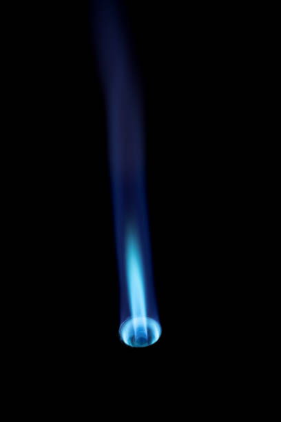istock Flamethrower burner gas blow torch Ignition with fire flame at black background 1257634571