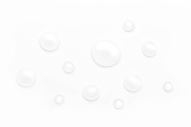 istock drops of water on a white background, top view. minimalism. purity 1257636271