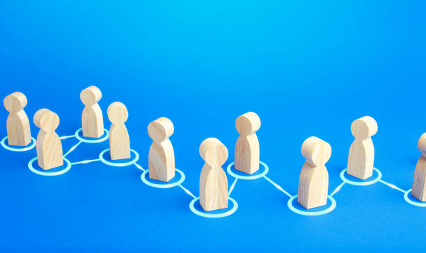 istock Chain of connected people. Cooperation, collaboration. Communication. Chain reaction, spread of information and rumors exchange. Partnership, unity, assistance. Interaction of persons. 1257636456