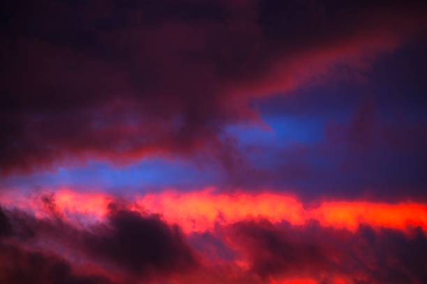 istock Clouds in the sky at dusk 1257640339