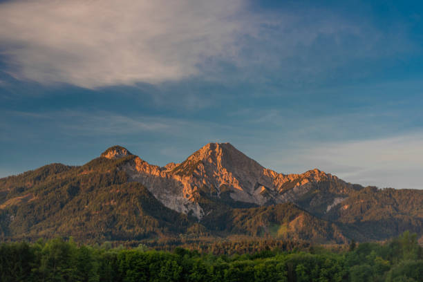istock Red Mittagskogel hill in summer fresh blue sky morning 1257640565