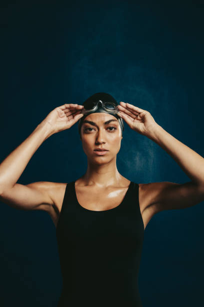 istock Confident woman in swimming costume 1257641676