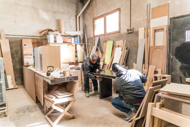 istock Carpenter working with wood in a lumberyard 1257642751