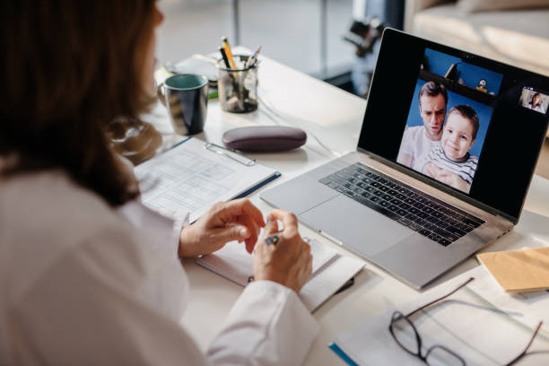 istock Pediatrician on a video call with her patients 1257645094