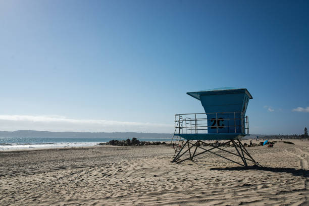 istock Lifeguard stand on California beach blue skies 1257646449