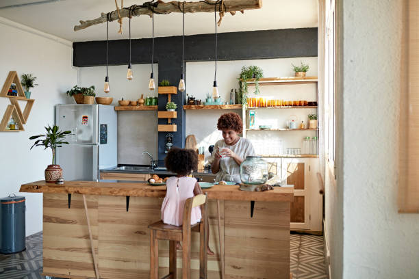 istock Single Mother Enjoying Breakfast With 3 Year Old Daughter 1257647009