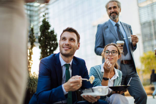 istock Enjoying lunch with coworkers and friends 1257650141