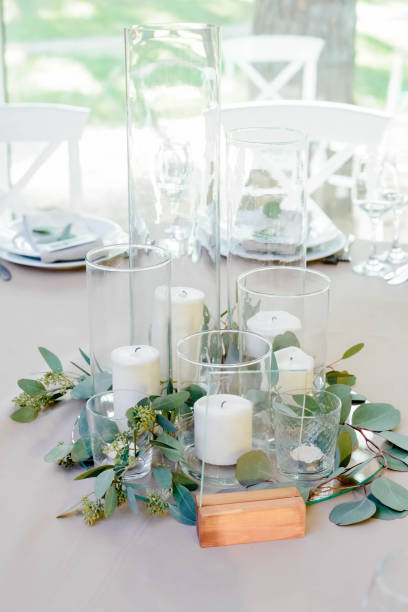 istock Wedding dinner decor, laid table with plate, Wedding calligraphy card, eucalyptus flower branch, view frome above 1257650395