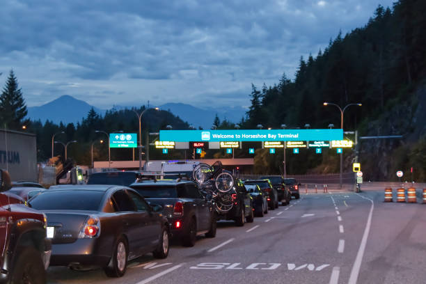 Horseshoe Bay Terminal with cars lining up to board BC ferries during Covid-19 pandemic stock photo