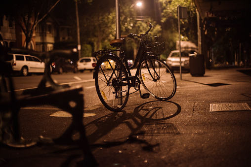 Photo of a bicycle in an empty city street