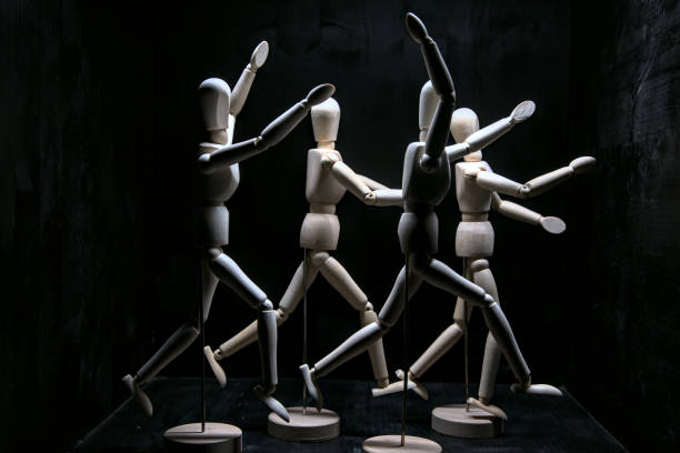 istock Drawing mannequins that pose like they are running away from something 1257660393