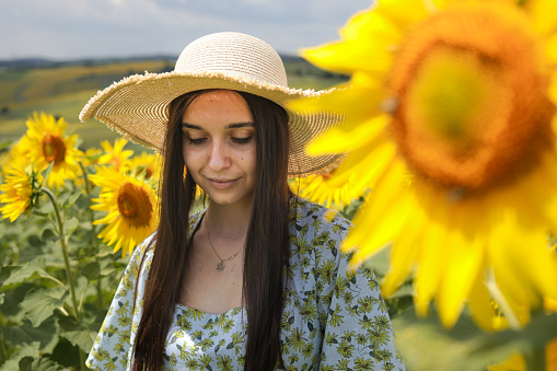 Free Woman, Nature, Sunflower and Agriculture Field.