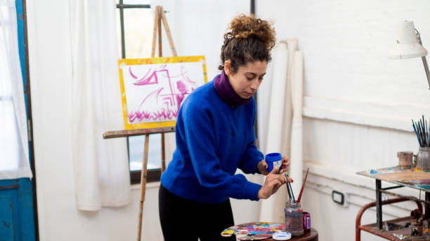 istock young artist painting 1257661055