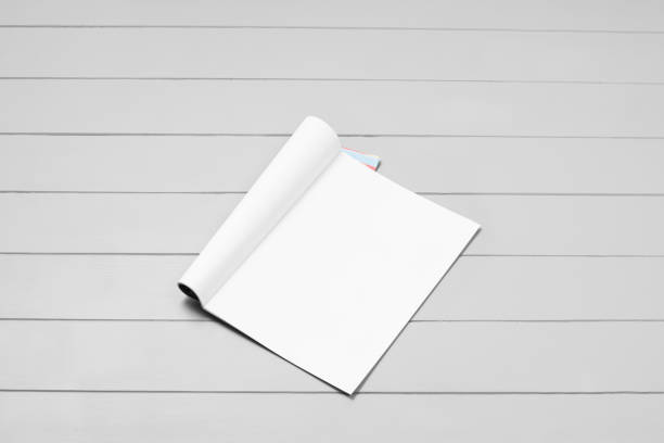 istock Mock-up magazine, newspaper or catalog on gray background. Blank page 1257664481