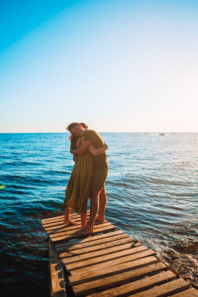 istock Young couple on white beach at summer vacation 1257665814