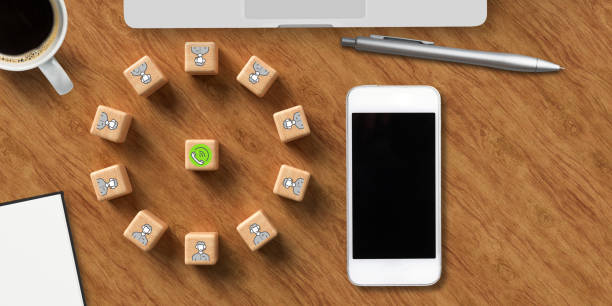 istock cubes with icons symbolizing a conference call and office equipment 1257668778