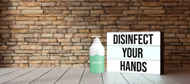 istock lightbox with message DISINFECT YOUR HANDS in front of brick wall - 3D rendered illustration 1257668873