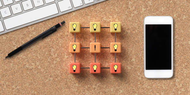 istock cube grid showing circle of lightbulb icons with computer equipment 1257669779