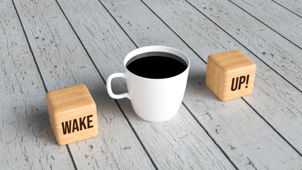istock cup of coffee and cubes with text WAKE UP! - 3d illustration 1257669901