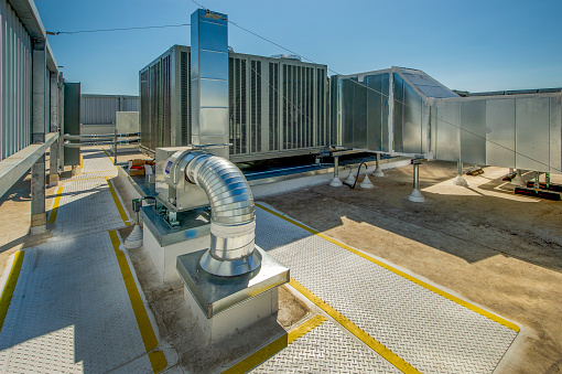 Rooftop HVAC with ducting.