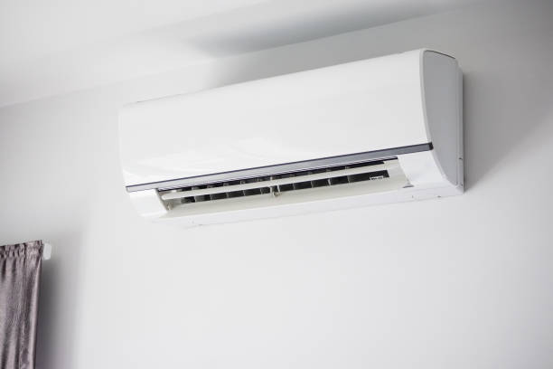 istock Air conditioner on white wall room interior background 1257674256