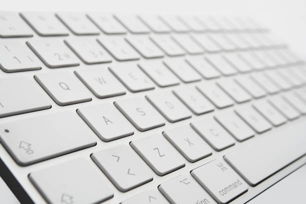 istock detail computer keyboards in white color 1257676572