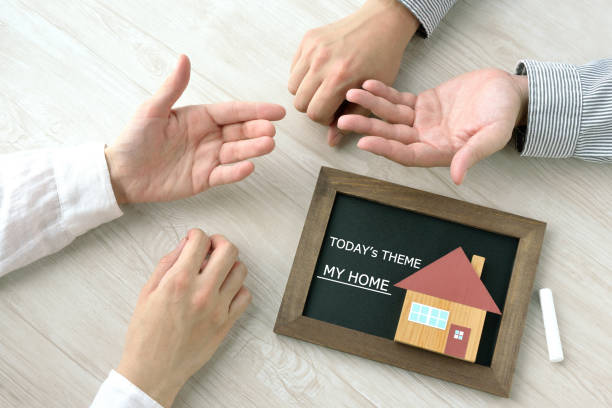 istock Couple talking about housing cost 1257685505