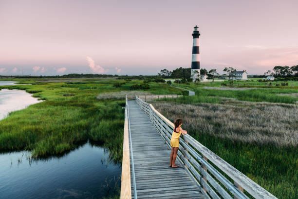 Girl Exploring the Outer Banks Girl Exploring the Outer Banks outer banks north carolina stock pictures, royalty-free photos & images