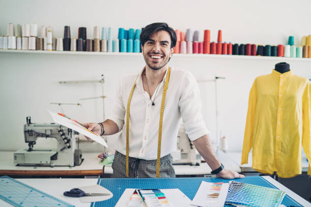 istock Tailor choosing fabrics in a fashion atelier 1257688446