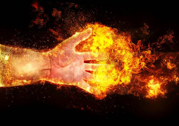 istock 3D illustration of a hand wrapped in flames 1257693775