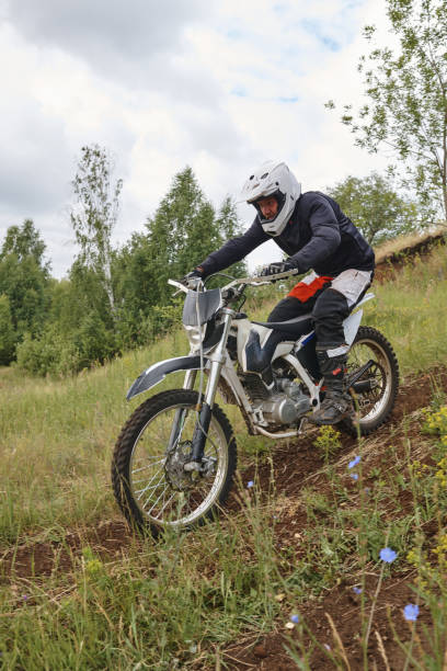 istock Riding motorcycle off-road track 1257697779