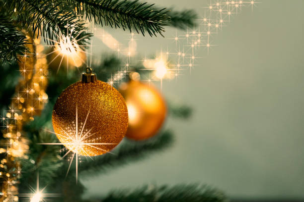 Christmas decorations on the branches fir with sparkles stock photo
