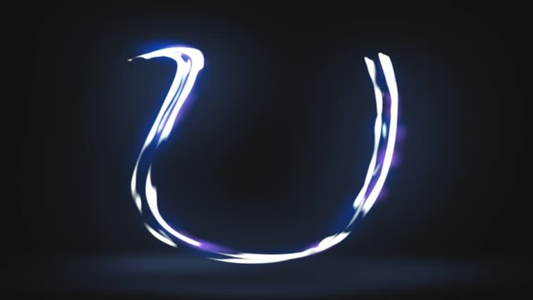 Light painting the alphabet in black background