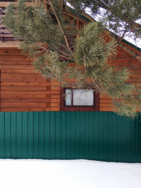 istock Winter house in the snow 1257707410