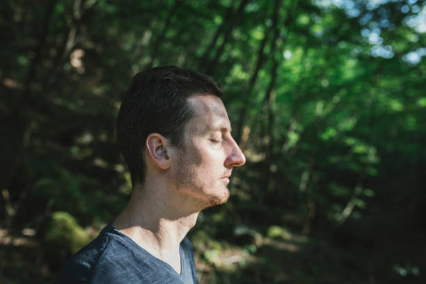 istock Man doing yoga in the mountain 1257707537