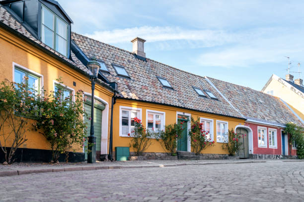 A street with old houses in the downtown of Lund in southern Sweden, Skane stock photo