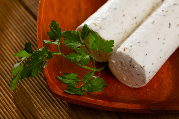 istock Soft goat cheese with herbs and garlic 1257710829