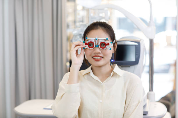 istock Cute woman test eye in lab 1257713752