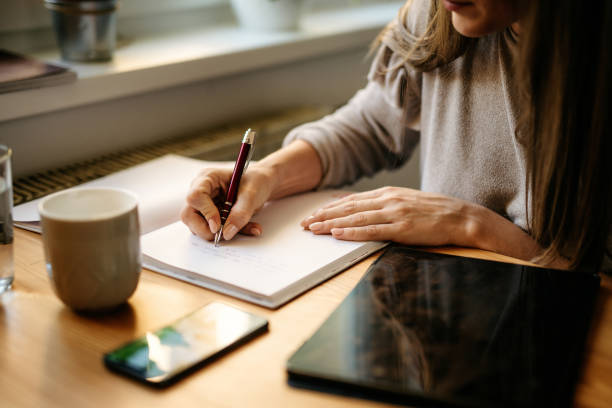 istock Young female adult working from home 1257714965