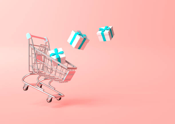 istock Flying shopping cart with gift on a pink background 1257717062