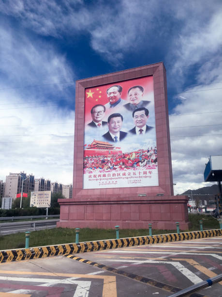 Photo of poster with faces of Chinese presidents Lhasa, Tibet / China - Jul 29, 2017: Photo of huge poster with faces of Chinese presidents. Erected to celebrate the 50th anniversary of the foundation of the Autonomous Region of Tibet. xi jinping stock pictures, royalty-free photos & images