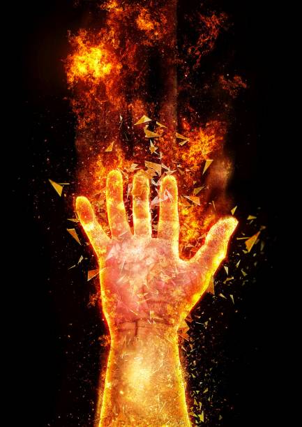 istock 3D illustration of a hand wrapped in flames 1257725799