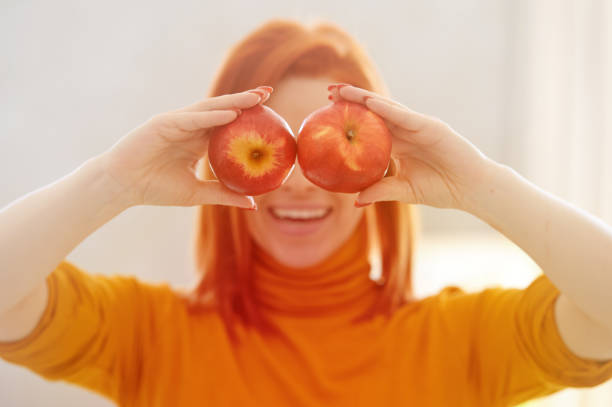 Humour concept with two apples