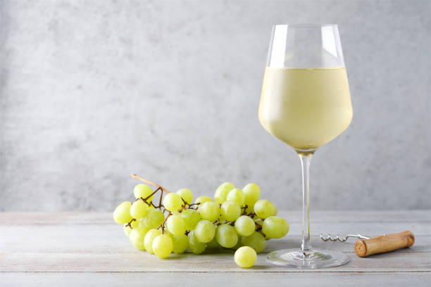 Misted glass of cold white wine on gray background Alcoholic beverage sauvignon blanc stock pictures, royalty-free photos & images