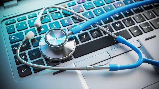 Stethoscope on laptop keyboard. Stethoscope on laptop keyboard. 3d render medical education stock pictures, royalty-free photos & images