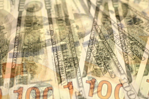 istock US one hundred dollar bills background. Money american hundred texture notes design. Financial concept. Financial operations 1257741711