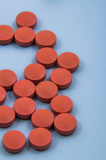 istock Arrange medicines by colors. 1257748496
