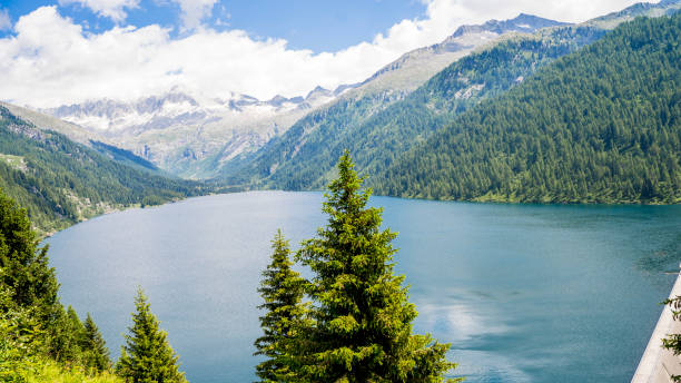 istock view of a beautiful lake surrounded by the dolomites 1257748656